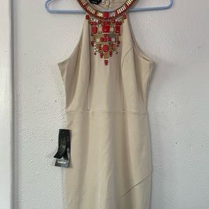 bebe tan color dress details on the neck